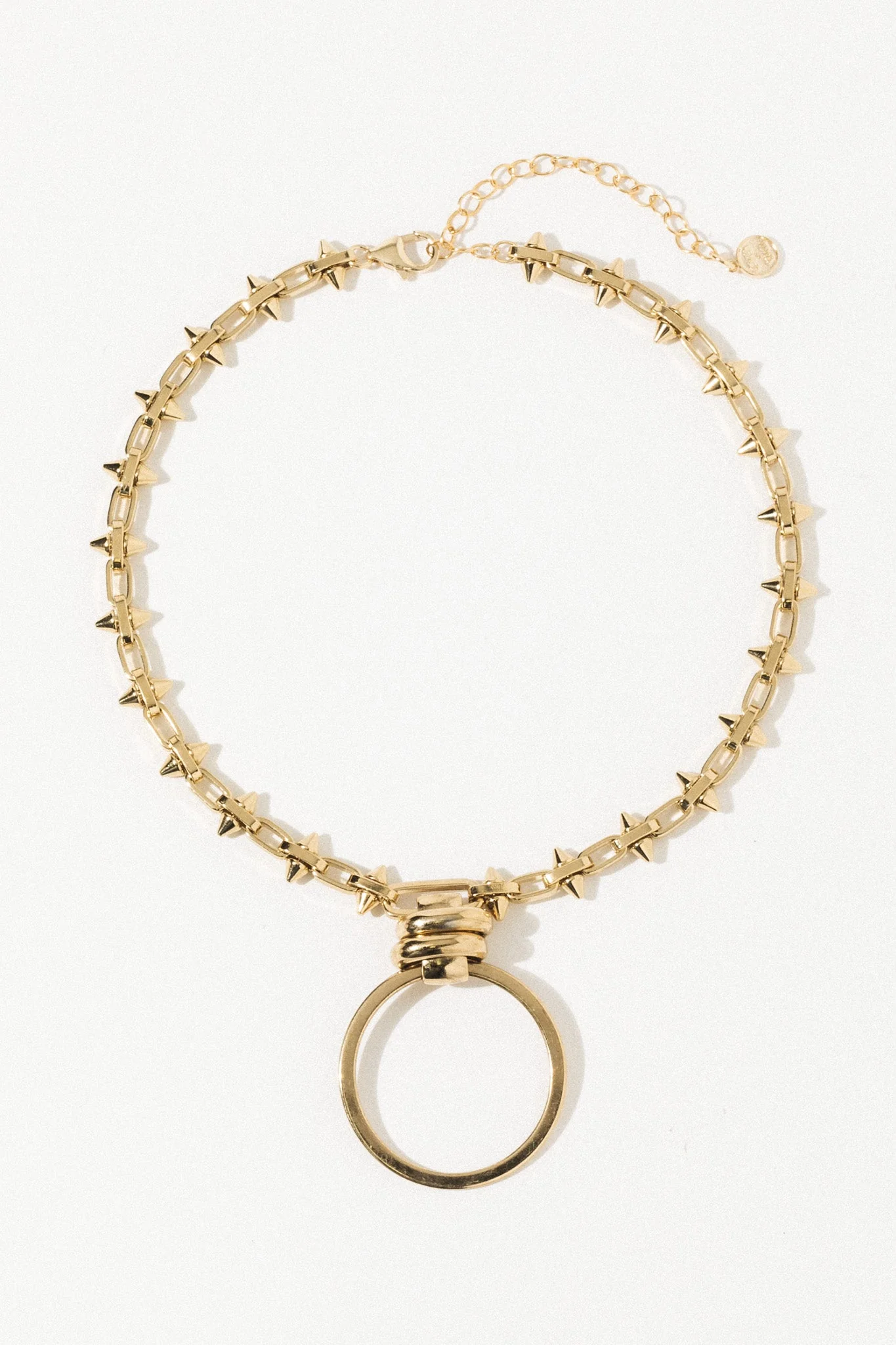 Elegance Redefined: The Spiked Hoop Necklace